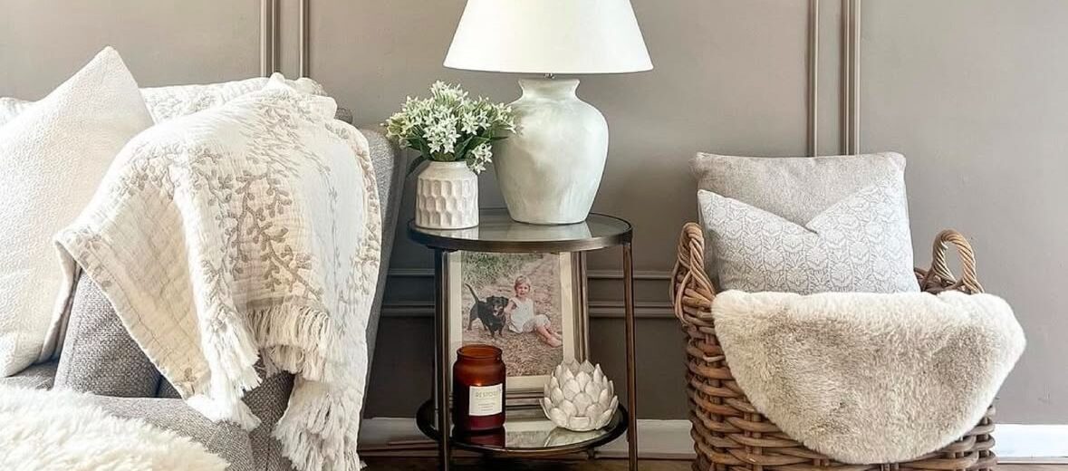 An interior shot of @simplycornishcosy's living room that displays furniture and LVT flooring.