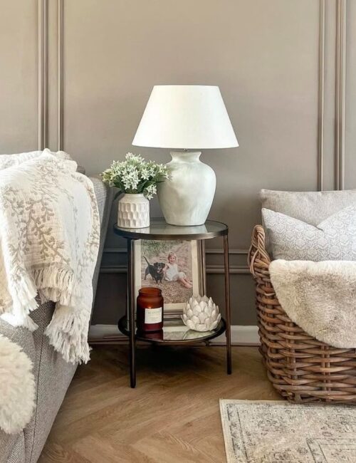 An interior shot of @simplycornishcosy's living room that displays furniture and LVT flooring.